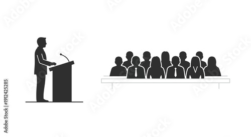 Man Speaking at Podium to Audience.