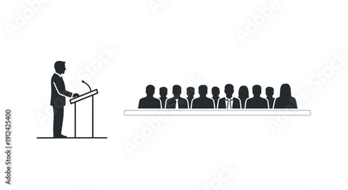 Man Speaking at Podium to Audience.