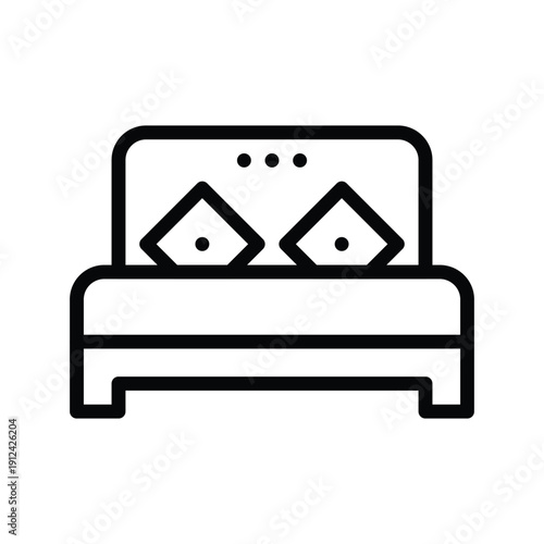 A minimalist black and white line drawing representing a bed with two square pillows and a headboard. Single Line Icon.