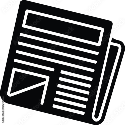 Black and white newspaper with text lines and folded corner