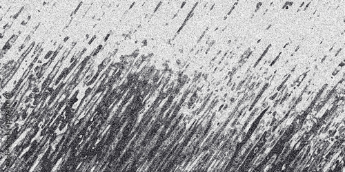 Monochrome textured background with dense diagonal dark brush strokes and a speckled grain effect, evoking a sense of movement and abstract art for creative applications