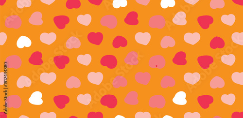 Vibrant orange background with scattered red and pink hearts in various shades and sizes, creating a festive pattern.