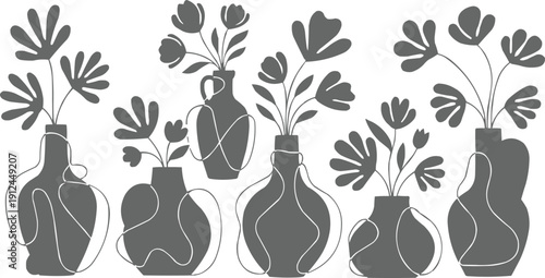 described showcases a striking black floral design set against a crisp white background, creating a strong contrast that highlights the intricacies of the artwork. The detailed depiction of leaves, 