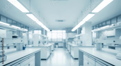 A laboratory with white counters and fluorescent lighting