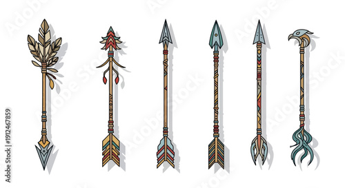 Collection of six tribal arrows with feathers and intricate designs.