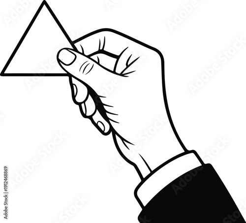A hand, possibly belonging to an adult, holding a triangular object, which appears to be a paper or a card.