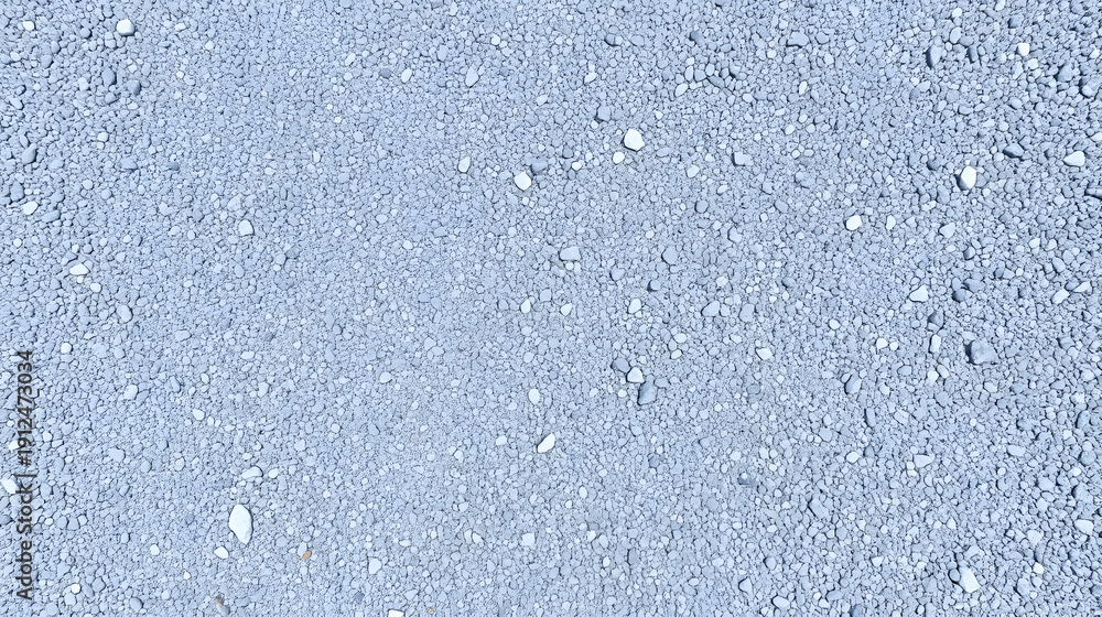 Fototapeta premium Light gray granite gravel road background. Closeup. Empty place for text. Top down view.