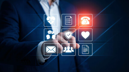Businessman touching virtual interface with insurance and service icons on blue background