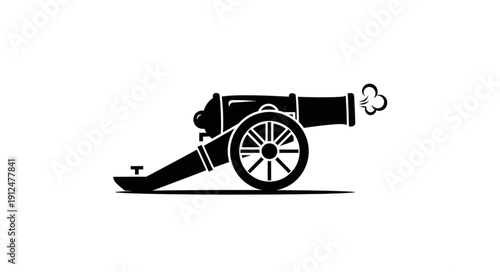 Silhouette of an old cannon firing smoke from its barrel.