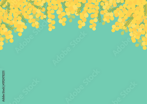 ターコイズブルーの背景に淡い黄色のミモザの花を上部に飾ったフレーム