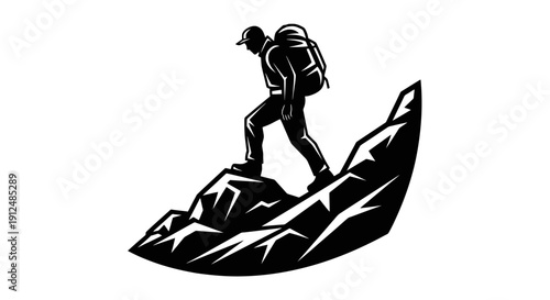 Silhouette of a hiker climbing a rocky mountain peak.