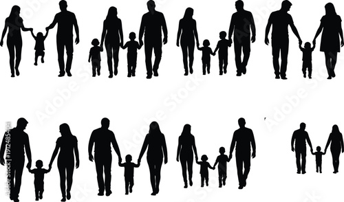 Silhouettes of families walking, parents and children holding hands