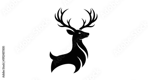 Silhouette of a majestic stag with large antlers.