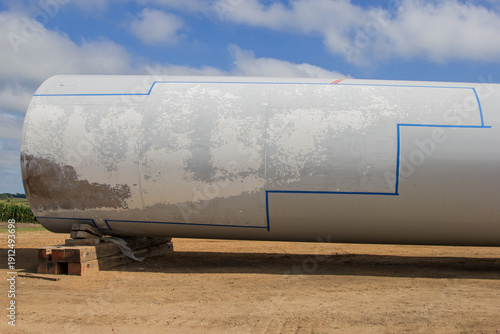 scuffed up wind turbine tower