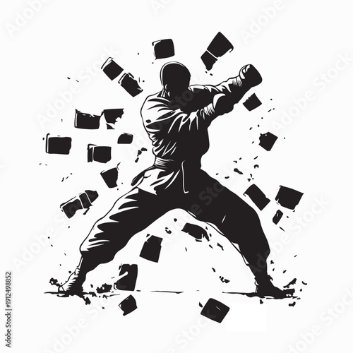 Martial Artist Breaking Brick Wall with Powerful Punch Silhouette