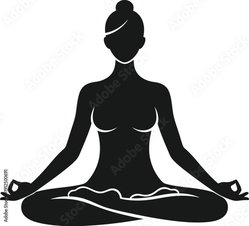Silhouette of a woman sitting in the lotus yoga position demonstrating meditation, mindfulness, and inner peace in.