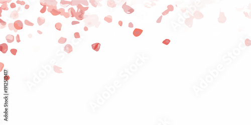 Falling red petals against a dark blurred background