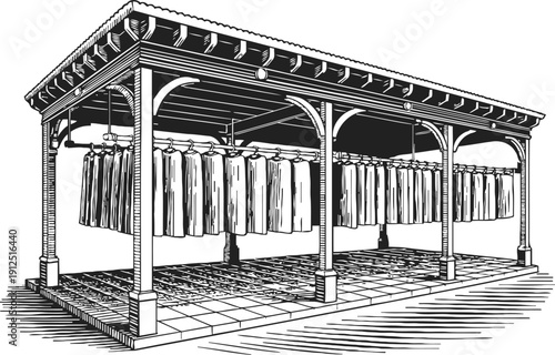 Historic industrial drying rack structure with hanging meat slabs for preservation process