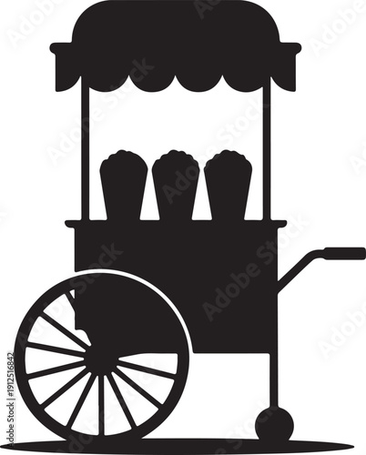 A classic silhouette of a popcorn concession stand cart with large wheels ready to serve snacks