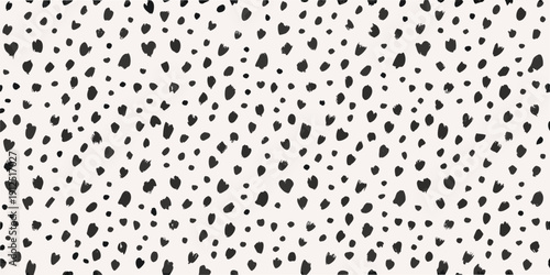 A dense pattern of irregular black spots on a white background