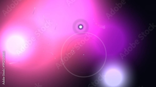 Vibrant neon lights in dark space with glowing circles and sparks
