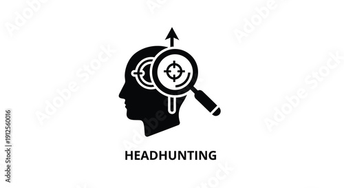 Headhunting concept with a magnifying glass over a human head silhouette