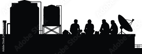 Silhouette of Friends Sitting on Rooftop with Water Tanks and Satellite Dish