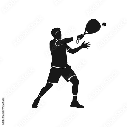 Silhouette of a man playing padel tennis, hitting the ball with a racket