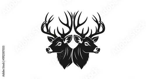 Two Majestic Deer Heads Facing Opposite Directions.