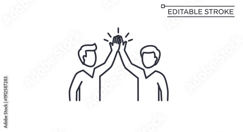 Two people giving each other a high five in celebration.