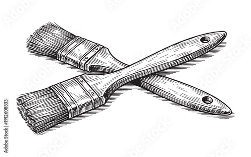 Pair of crossed professional wooden paint brushes representing fine art and painting. Hand-drawn engraving style.