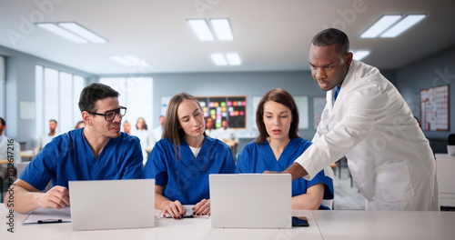 Obraz na płótnie Medical Students In University Classroom Learning From Doctor