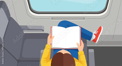 Woman reading a book on a train journey comfortably.