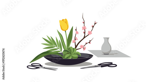Traditional Japanese ikebana floral arrangement with yellow tulip, pink blossoms, and green leaves in a dark shallow bowl.