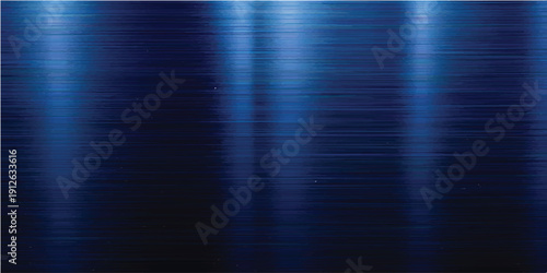 A shiny brushed metal texture with a blue abstract background features a silver stainless steel surface and dark metallic plate design for a sleek gray aluminum wallpaper backdrop