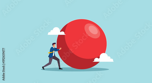 Man pushing giant red ball uphill