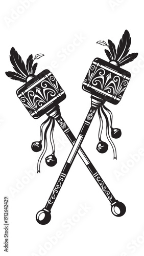 Decorative crossed ceremonial staffs with carved patterns and tassels from cultural ritual artifacts.
