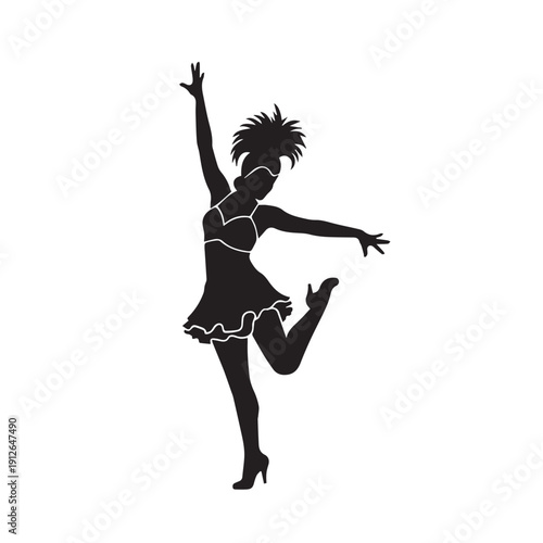 Elegant silhouette of a dancer performing a dynamic ballet pose in motion.