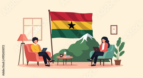 Two individuals work on laptops with a Ghanaian flag and mountains in the background