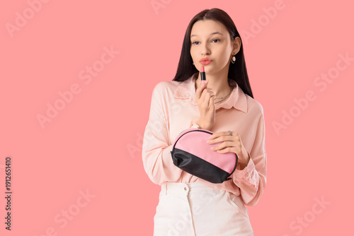 Teenage girl with lipstick ...