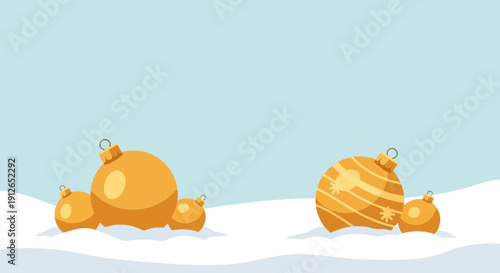 Two groups of festive golden baubles nestled in snowy drifts under a pale sky