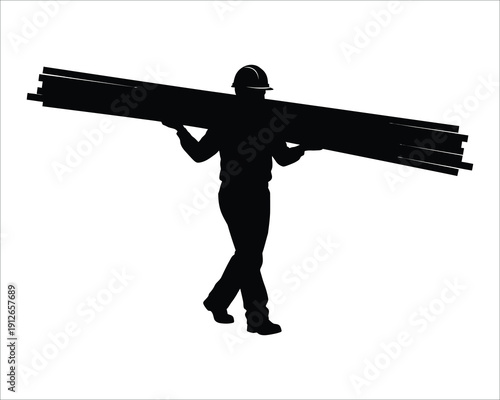 A silhouette of a person carrying a long heavy object
