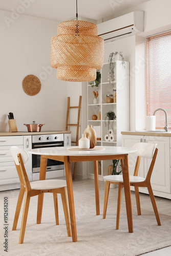 Interior of light kitchen w...