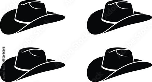 Four Cowboy Hats Silhouettes on Dark Background