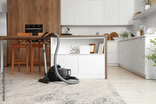 Interior of kitchen with va...