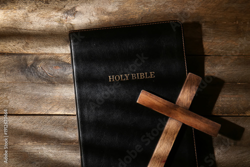 Holy Bible with cross and s...