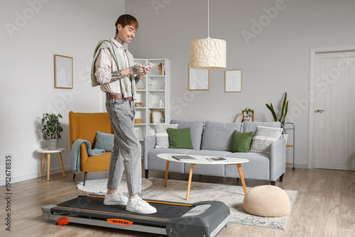 Handsome businessman using ...