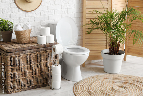 Toilet bowl, laundry basket...