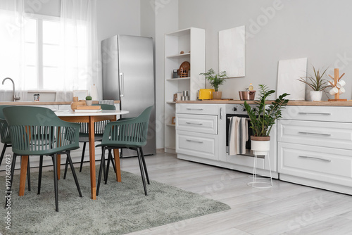 Interior of light kitchen w...
