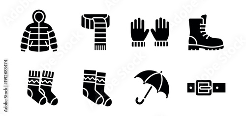 Winter wear silhouette icons set